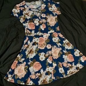 Floral short dress worn a few times very comfortable and cool .